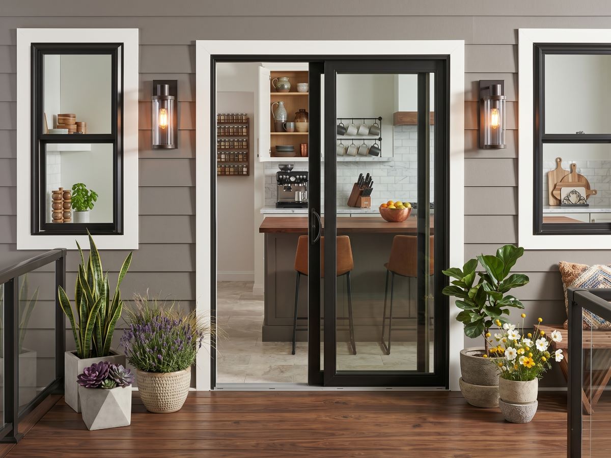 Sliding patio door with glass panels